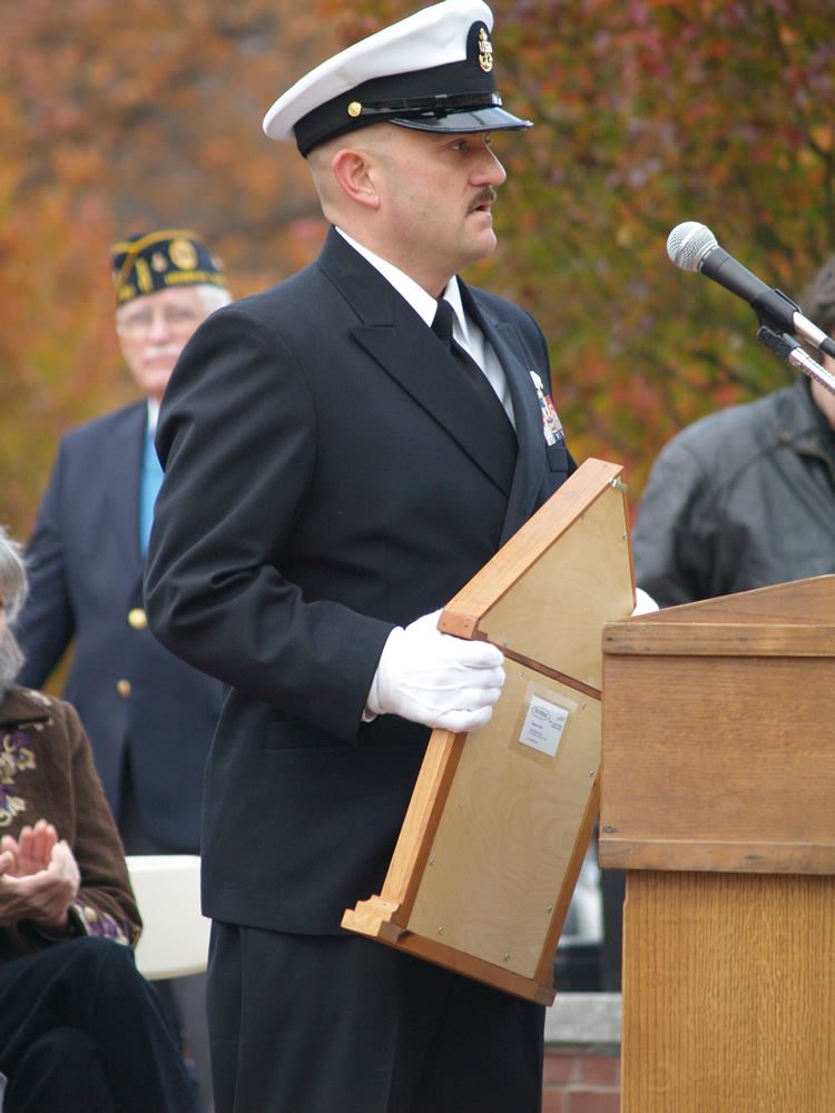 Speaker 3 at Podium